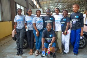 A group photo of the students inside Innoson Vehicle Manufacturing Company.